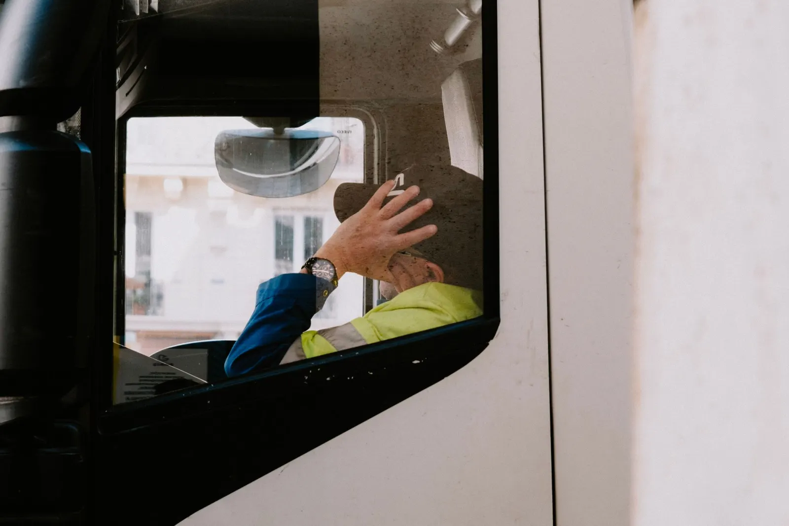 Truck driver at work in the cabin