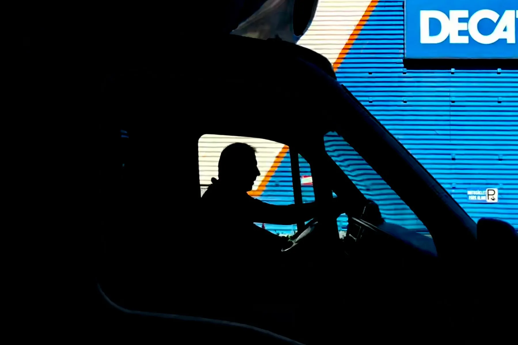 Driver at the wheel of a freight truck